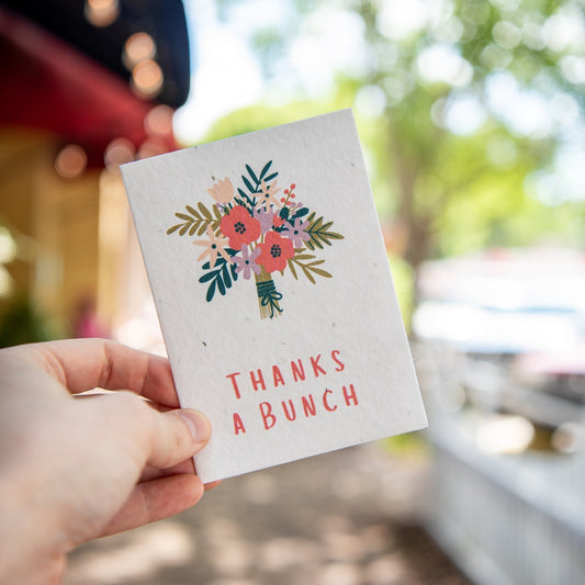 Still Magnolia Thanks a Bunch plantable seed card with floral design, eco-friendly greeting card for special occasions.