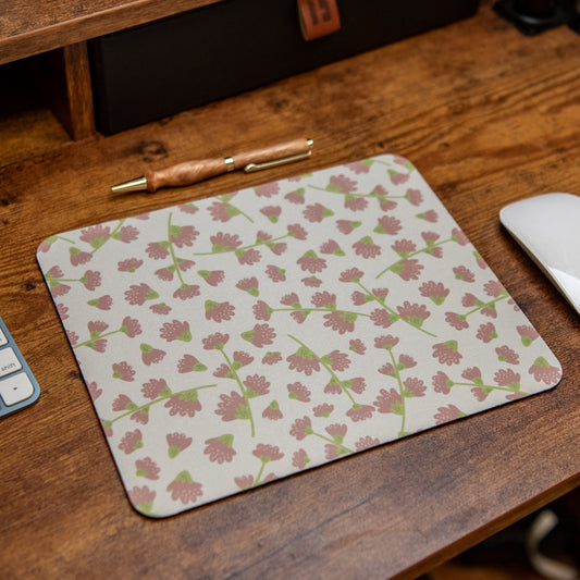 Still Magnolia purple floral mouse pad featuring a vibrant floral design on a smooth surface for comfortable use.