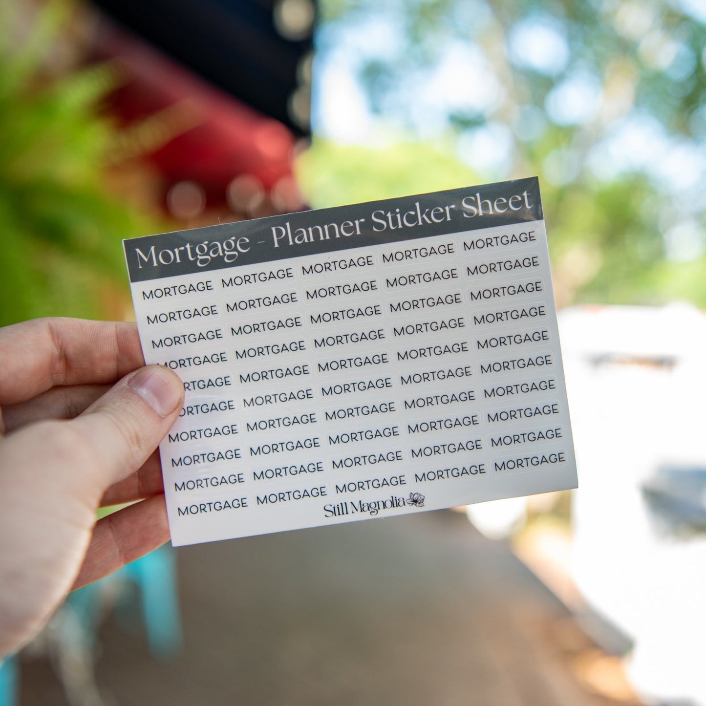 Still Magnolia mortgage planner sticker sheet with decorative icons and labels for organizing mortgage-related tasks.