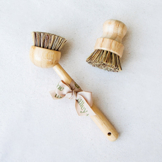Tilley + Me sustainable bamboo pot scrubber for utensils, tough on stains, gentle on the environment, with a compact layflat design