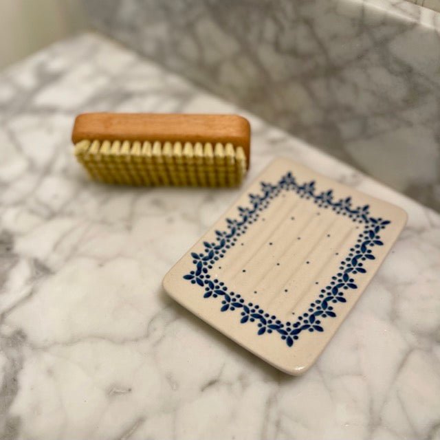 The Celtic Farm gardener's nail brush with stiff bristles for cleaning dirt and mud from nails after gardening.