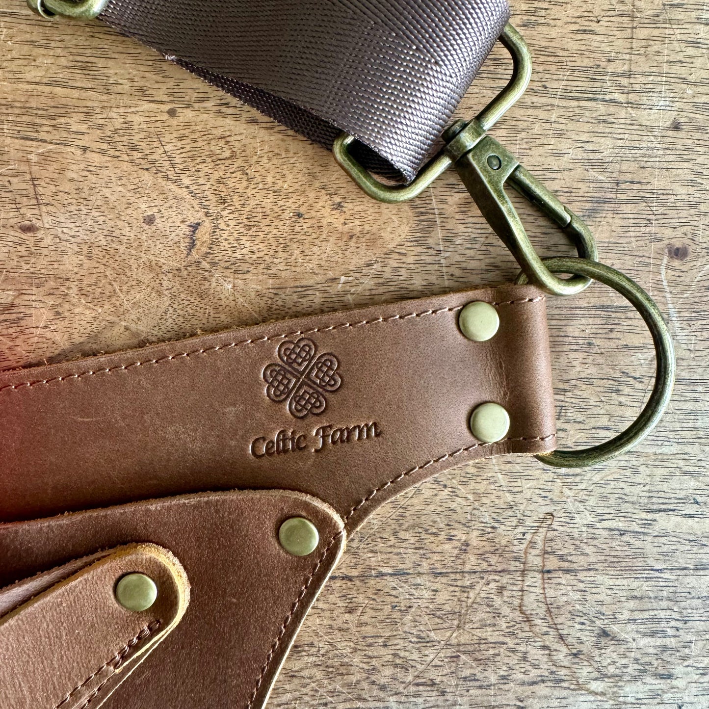 The Celtic Farm Ultimate Leather Garden Tool Belt and Holder with extra rivet reinforcement, designed for master gardeners.
