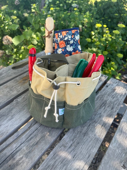 Heavy waxed canvas garden bucket bag by The Celtic Farm, versatile gardening tote with durable, water-resistant design.
