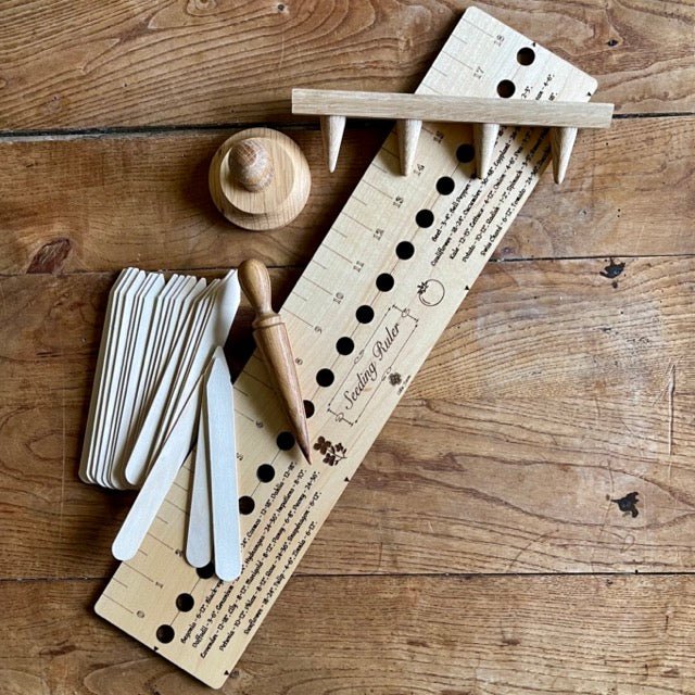Garden gift set by The Celtic Farm including American hardwood seed and bed ruler, dibblers, pot tamper, and markers.