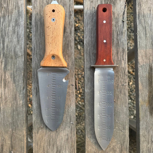Celtic Farm Tanto Hori Hori garden tool with a wooden handle and stainless steel blade, designed for digging and planting.