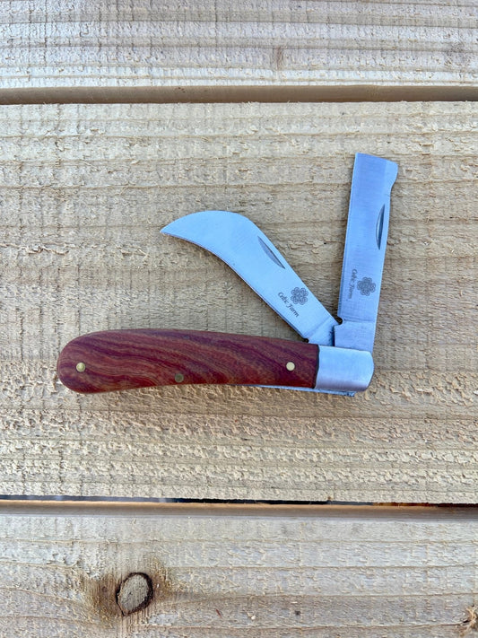 Professional gardener's knife by The Celtic Farm, ideal for pruning, grafting, and propagation; shows the sharp blade and handle.