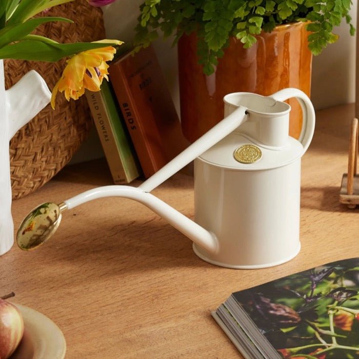 Dark green Haws Rowley Ripple watering can by The Celtic Farm, features a textured handle and spout for easy watering.