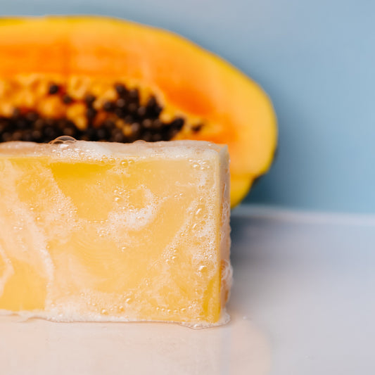 Mango and papaya enzyme bar soap by Timeless Organics Skin Care, with fresh fruit ingredients and natural cleansing properties.