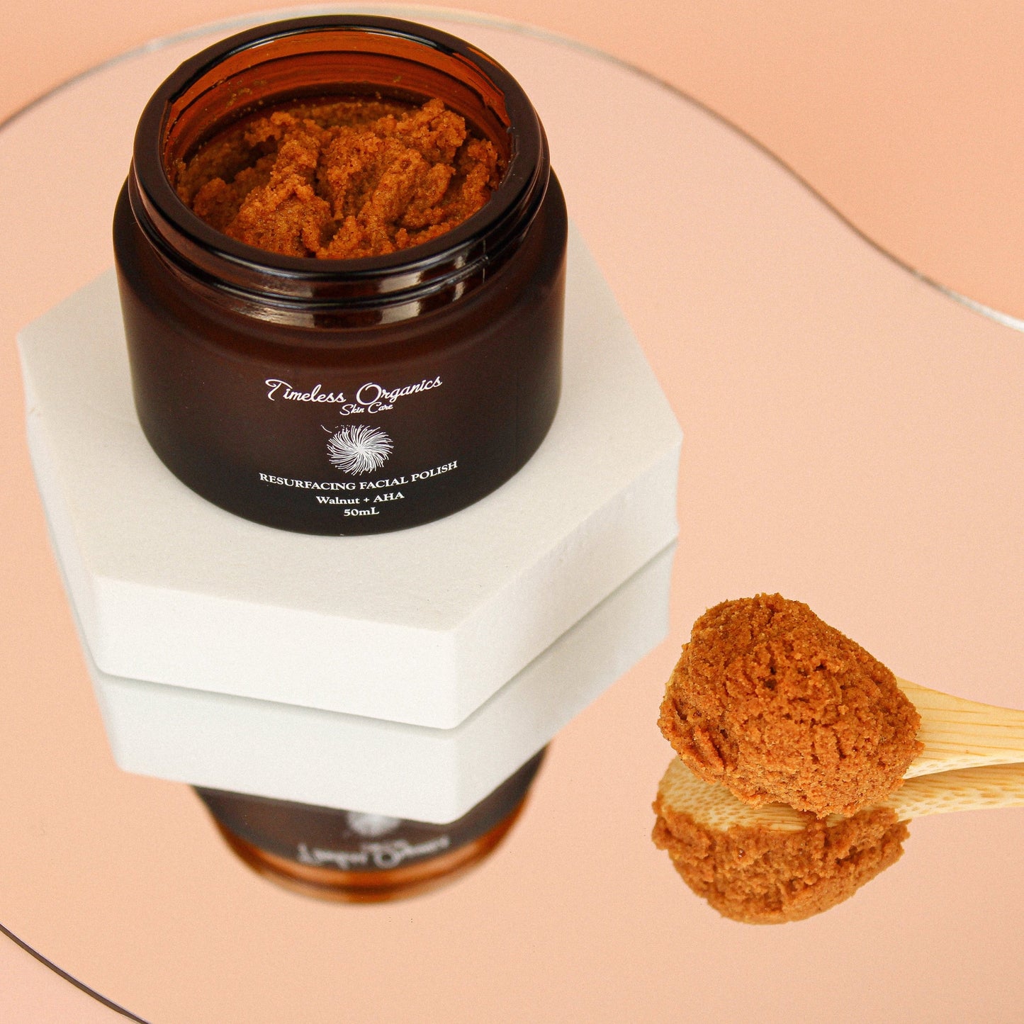 Timeless Organics Skin Care Resurfacing Facial Polish with Walnut and AHA, showing a jar of exfoliating facial scrub with walnut pieces.
