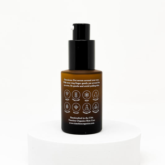 Timeless Eye Serum by Timeless Organics Skin Care showing a clear glass bottle with a dropper for eye treatment.