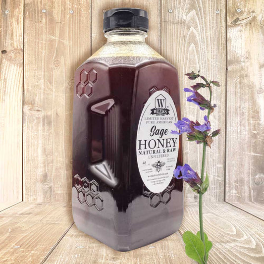 16-ounce jar of Weeks Honey Farm raw sage honey, showcasing golden honey with a rustic label, limited harvest all-natural honey.