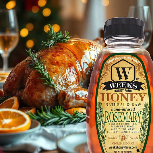 Hand-infused rosemary honey from Weeks Honey Farm, showcasing a jar of herbaceous honey for teas and recipes.