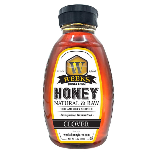 Raw clover honey from Weeks Naturals, 12-ounce jar, showcasing golden honey with a honey dipper.