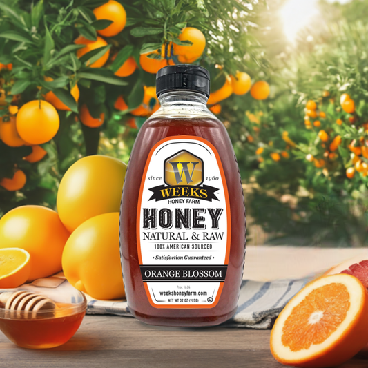Jar of Weeks Naturals pure raw orange blossom honey from Weeks Honey Farm, showcasing golden honey in a glass jar.