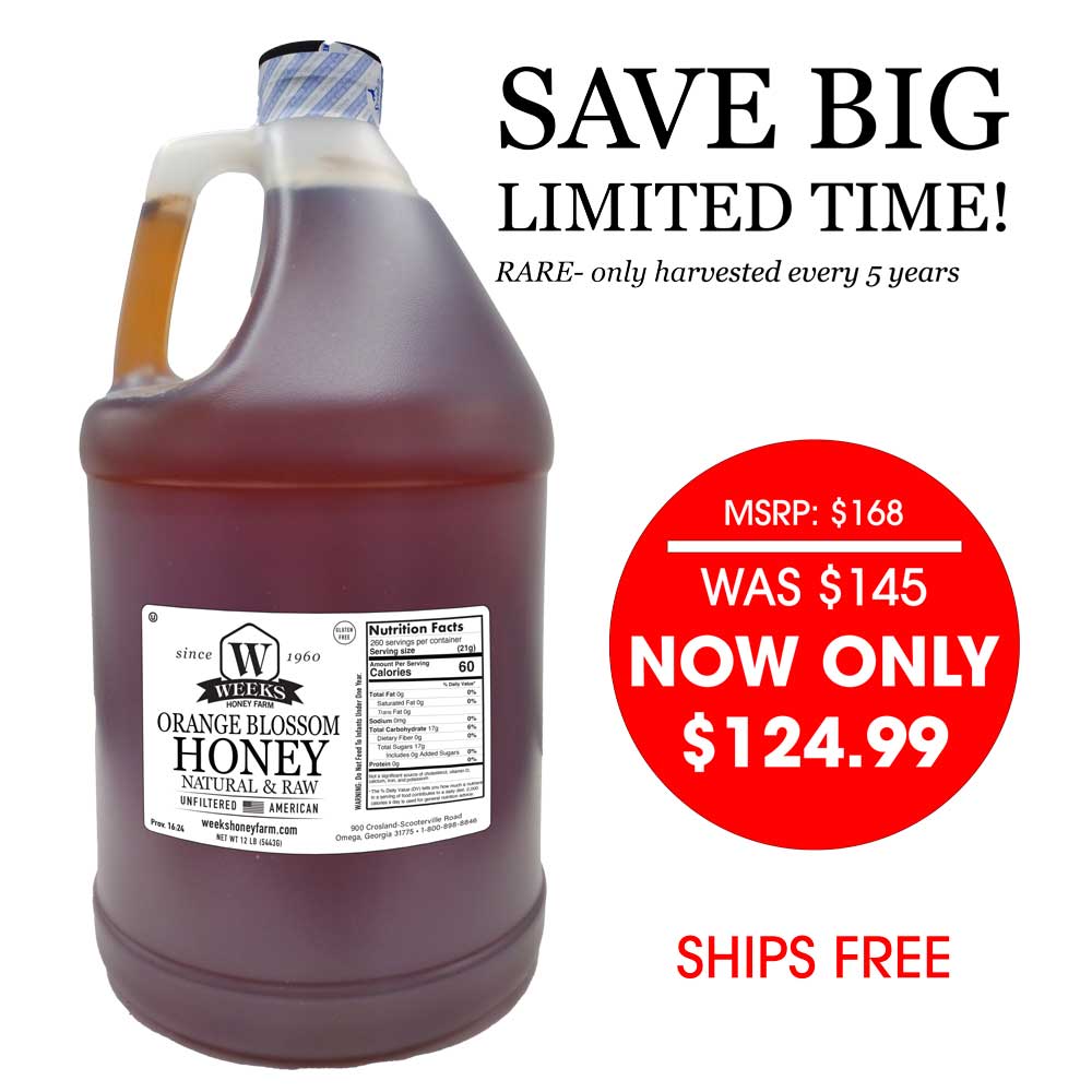 Glass jar of Weeks Naturals pure raw orange blossom honey with a golden hue, labeled as all-natural and 12 ounces.