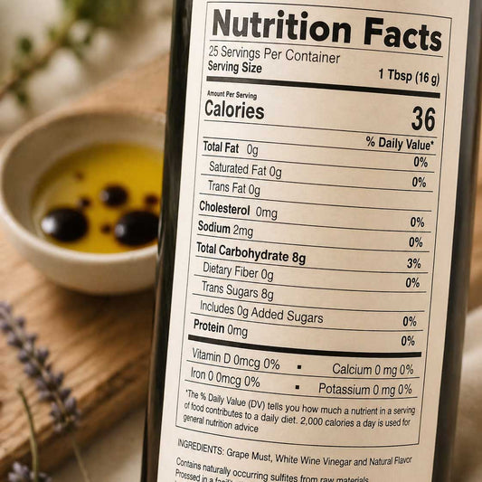 White Lavender Balsamic Vinegar in a 12.7 oz bottle from Our Lavender Co, featuring a white label and aromatic lavender flavor.