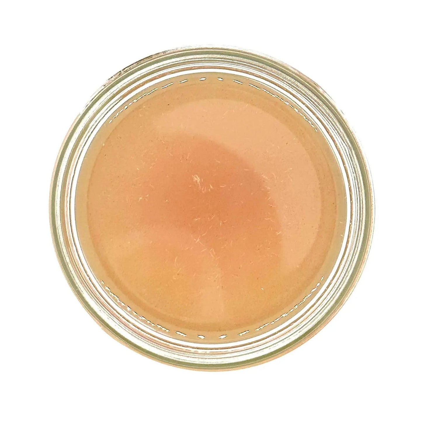 Bottle of Your Only Earth Rose Coconut Oil showing the label and clear liquid inside, highlighting natural skincare product.