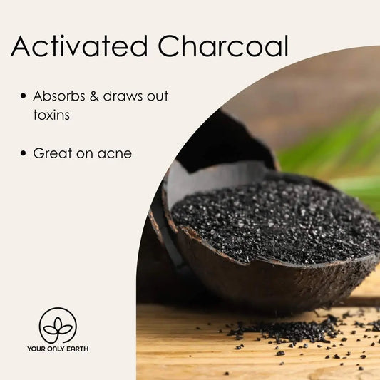 Bar of Your Only Earth charcoal soap with a dark, textured surface, showcasing its natural cleansing ingredients.