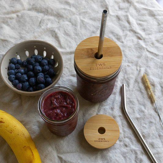Wide-mouth bamboo mason jar lid for drinkware from ZeroWasteStore.com, eco-friendly bamboo material with a secure seal.