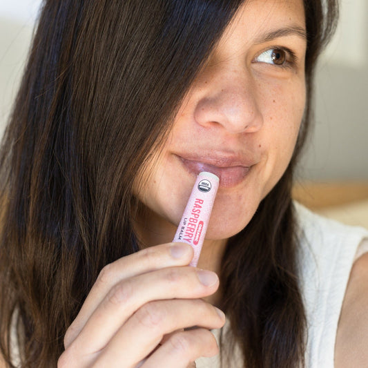 All-natural almond vanilla lip balm in a sleek container, showcasing smooth texture and organic ingredients from ZeroWasteStore.com