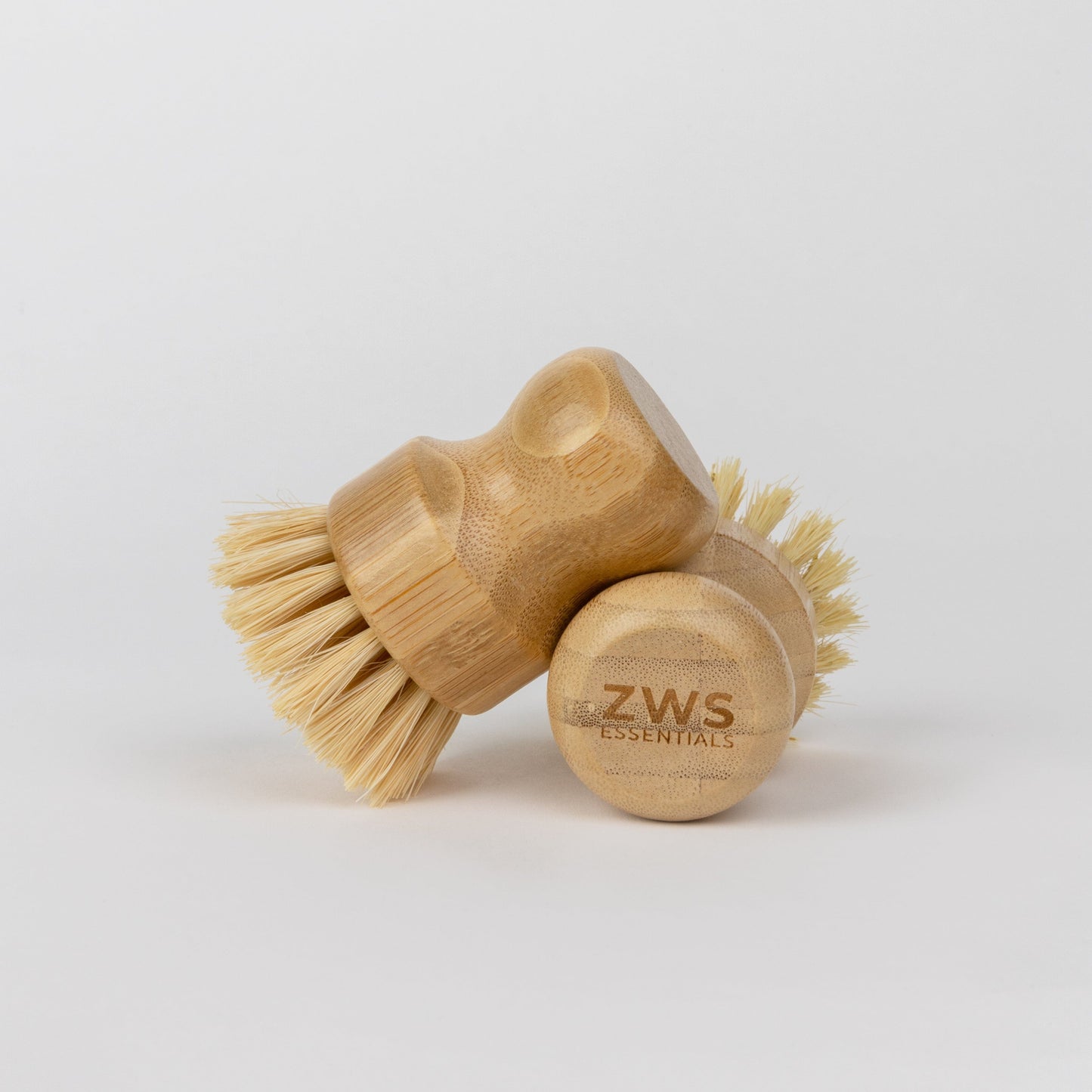 ZeroWasteStore.com dish scrub brush with sturdy handle and bristles, ideal for cleaning dishes and kitchen surfaces.