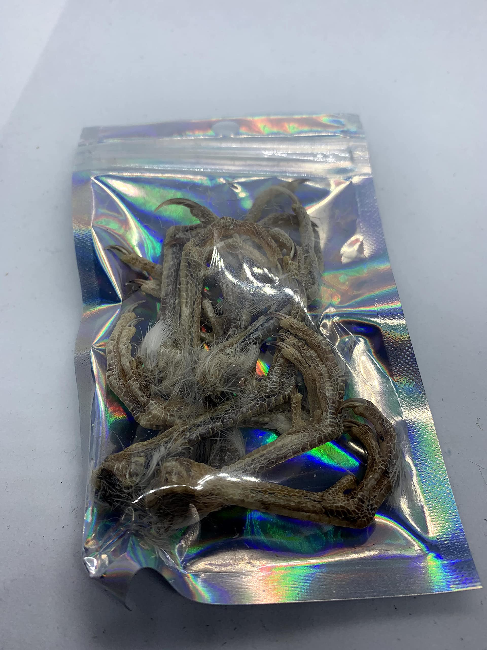 Quailz.com quail feet dog training treat and aid, showing natural dried quail feet for pet training and treats