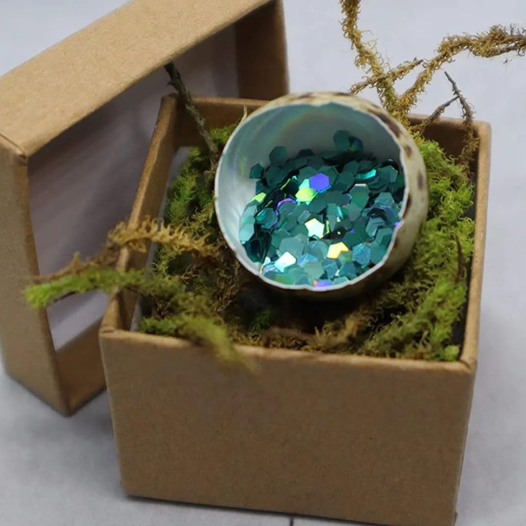Quailz.com gender reveal kit with 3 hollow quail eggs, glitter, and craft box for creative pregnancy announcements and baby shower ideas