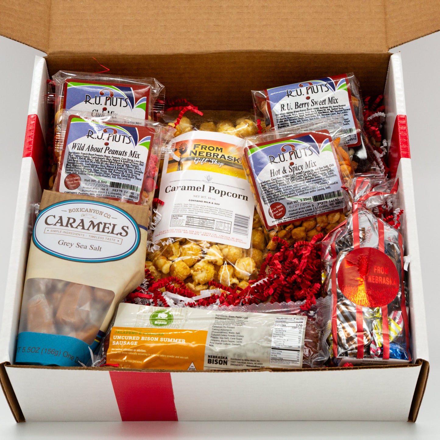 Nebraska Snacks Gift Box from BuyNebraska.com featuring assorted local snacks in a gift basket, perfect for gifting.