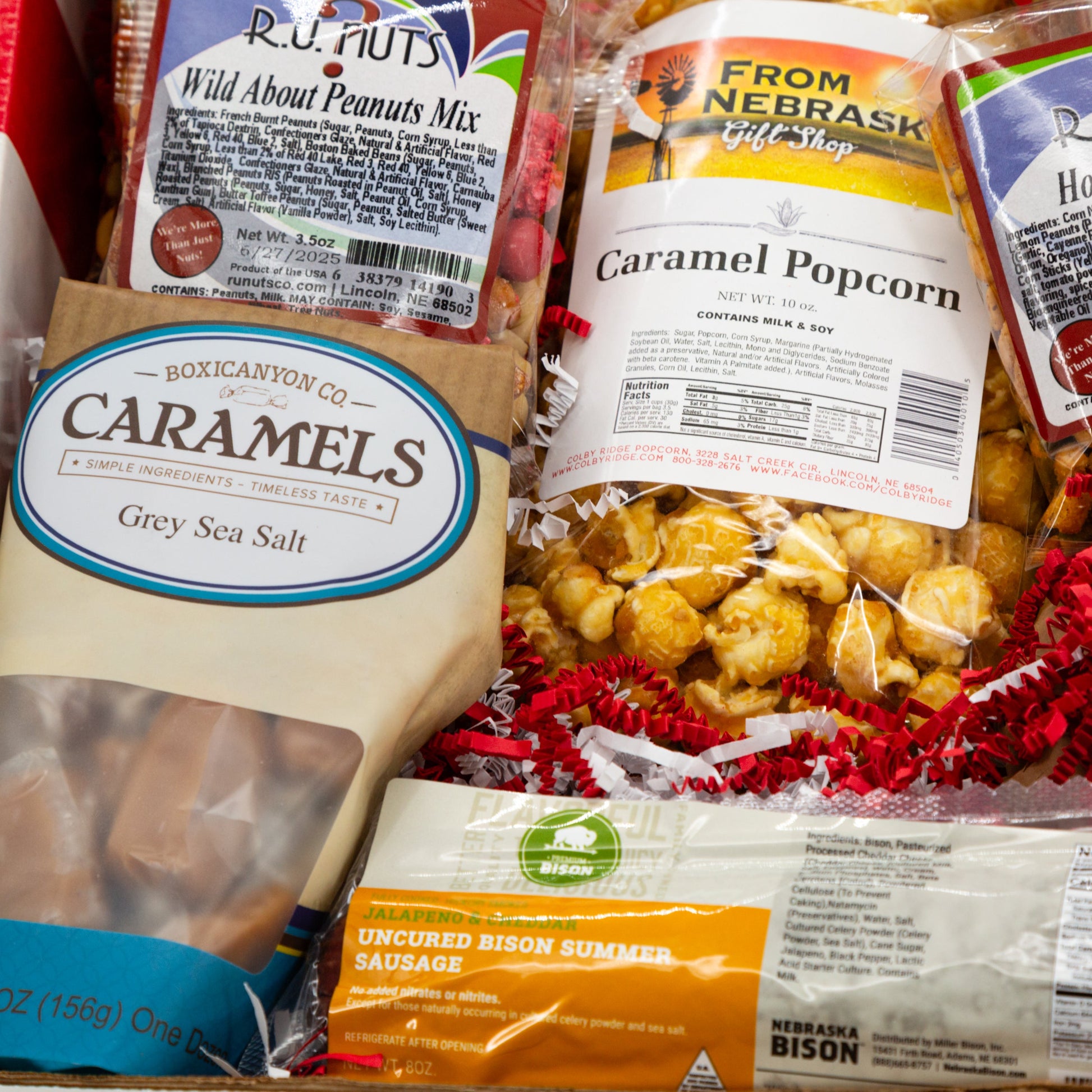 Nebraska Snacks Gift Box by BuyNebraska.com featuring assorted local snacks in a decorative gift basket.