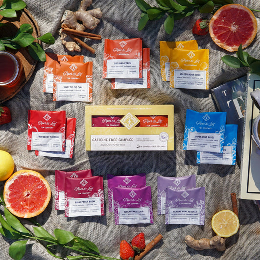 Caffeine-free tea tasting flight with 12 assorted tea bags from Piper and Leaf Tea Co., displayed in a box.