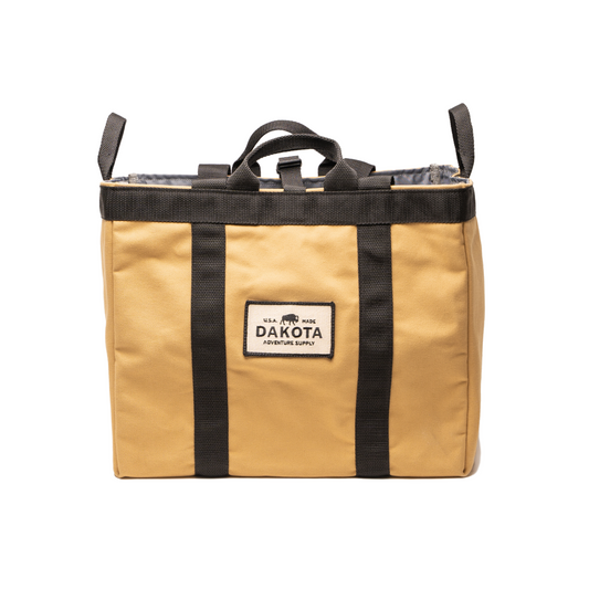 Dakota Adventure Supply Adventure Tote bag, durable canvas material with leather handles, suitable for travel and daily use.