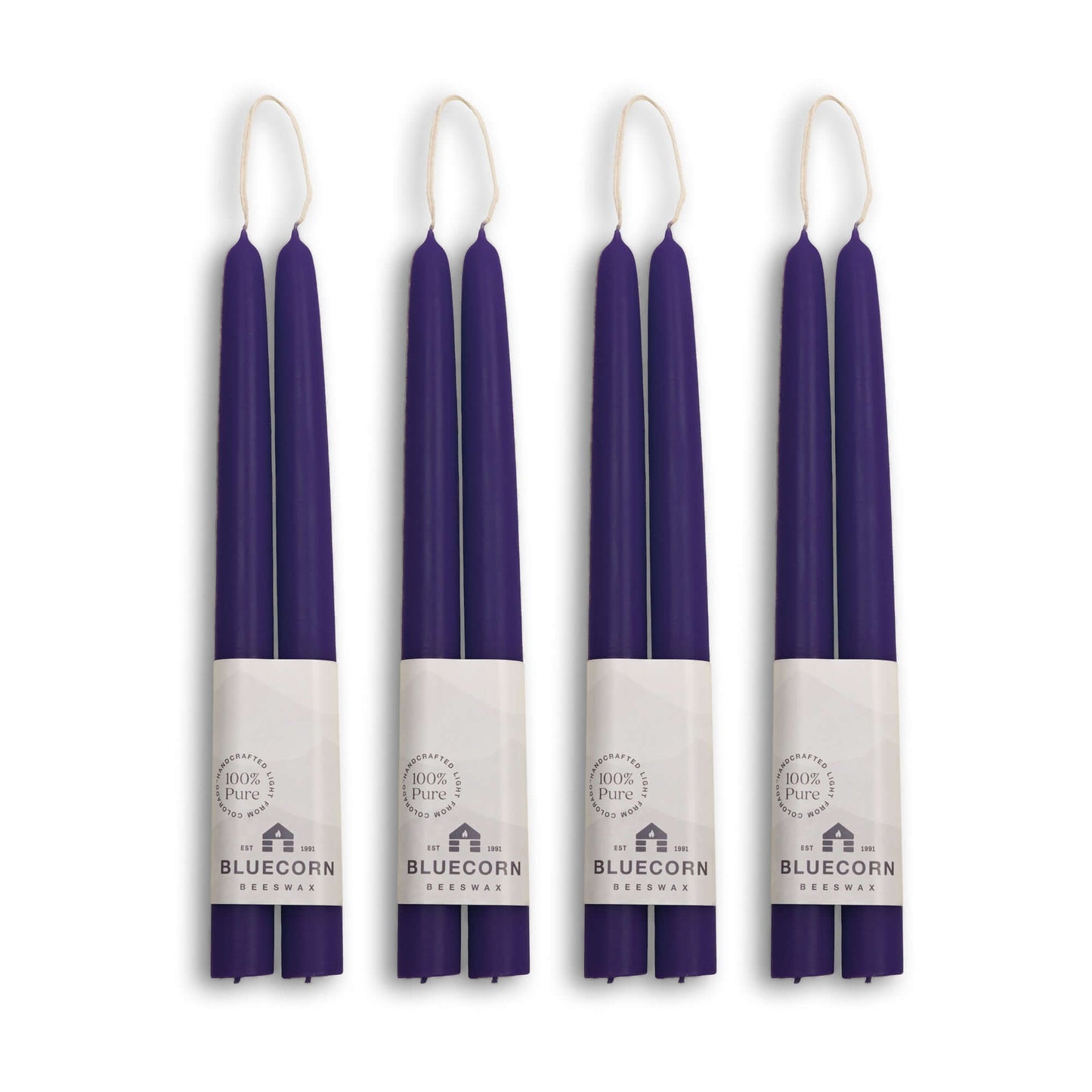 Set of four pairs of 10-inch eggplant purple beeswax taper candles by Bluecorn Candles, handcrafted for elegant lighting.