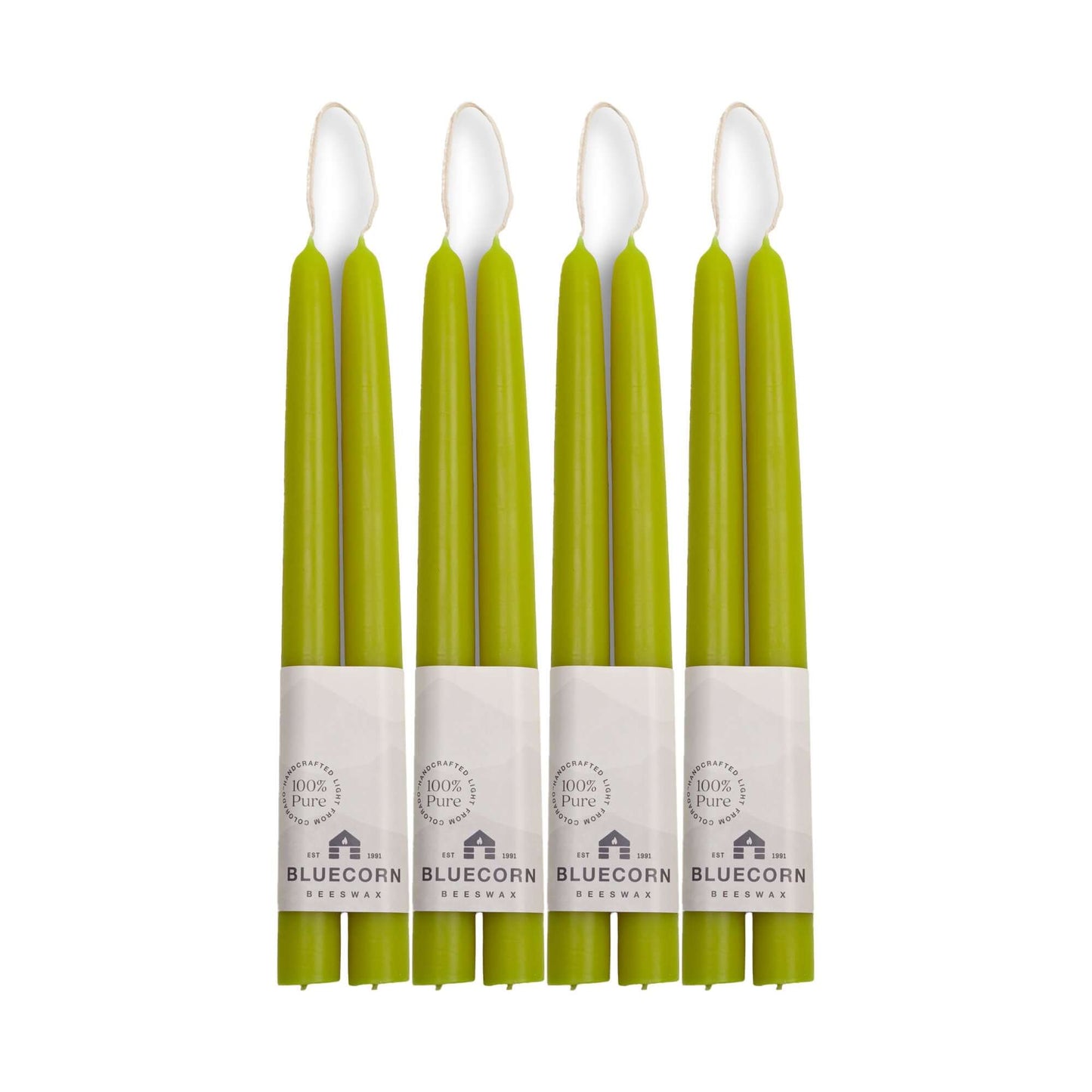 Set of 8 pistachio green hand-dipped beeswax taper candles from Bluecorn Candles, 10 inches tall, in a bulk bundle.