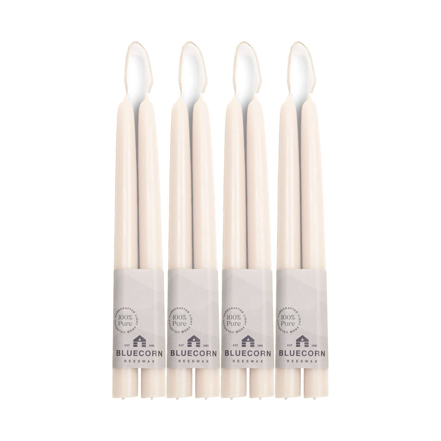 Set of eight 10-inch white beeswax taper candles from Bluecorn Candles, ideal for elegant lighting and decorative use.