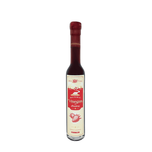 Bottle of Olive Crate 100% organic balsamic vinegar with strawberry, featuring a dark vinegar liquid and fresh strawberries on the label