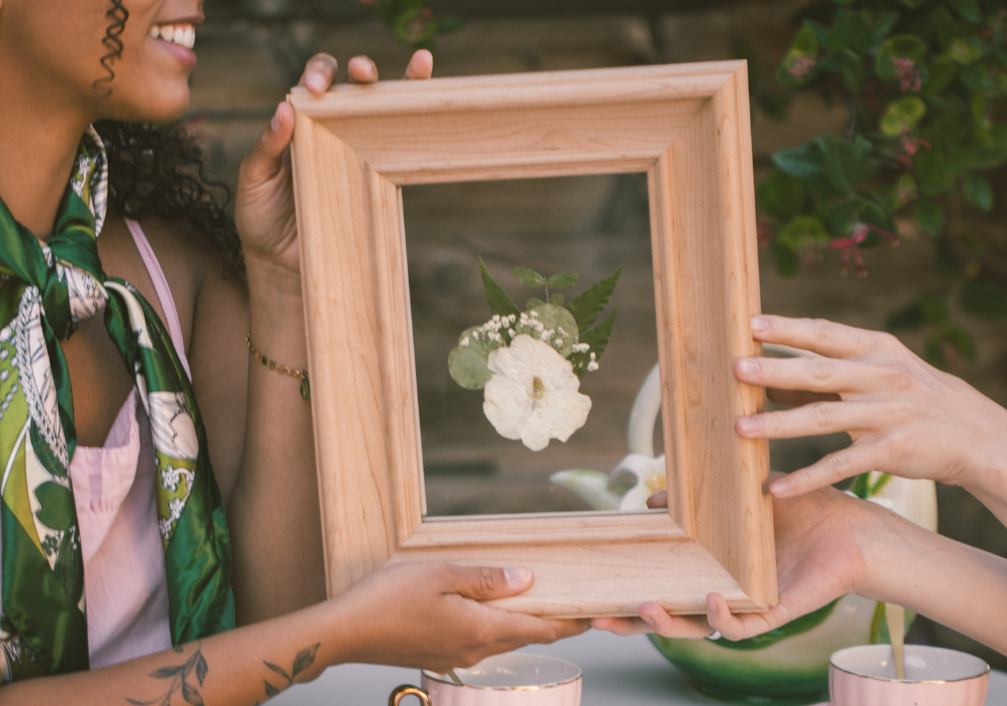 Pressed Floral boutonniere frame with a delicate floral design for showcasing a single boutonniere or small floral arrangement.
