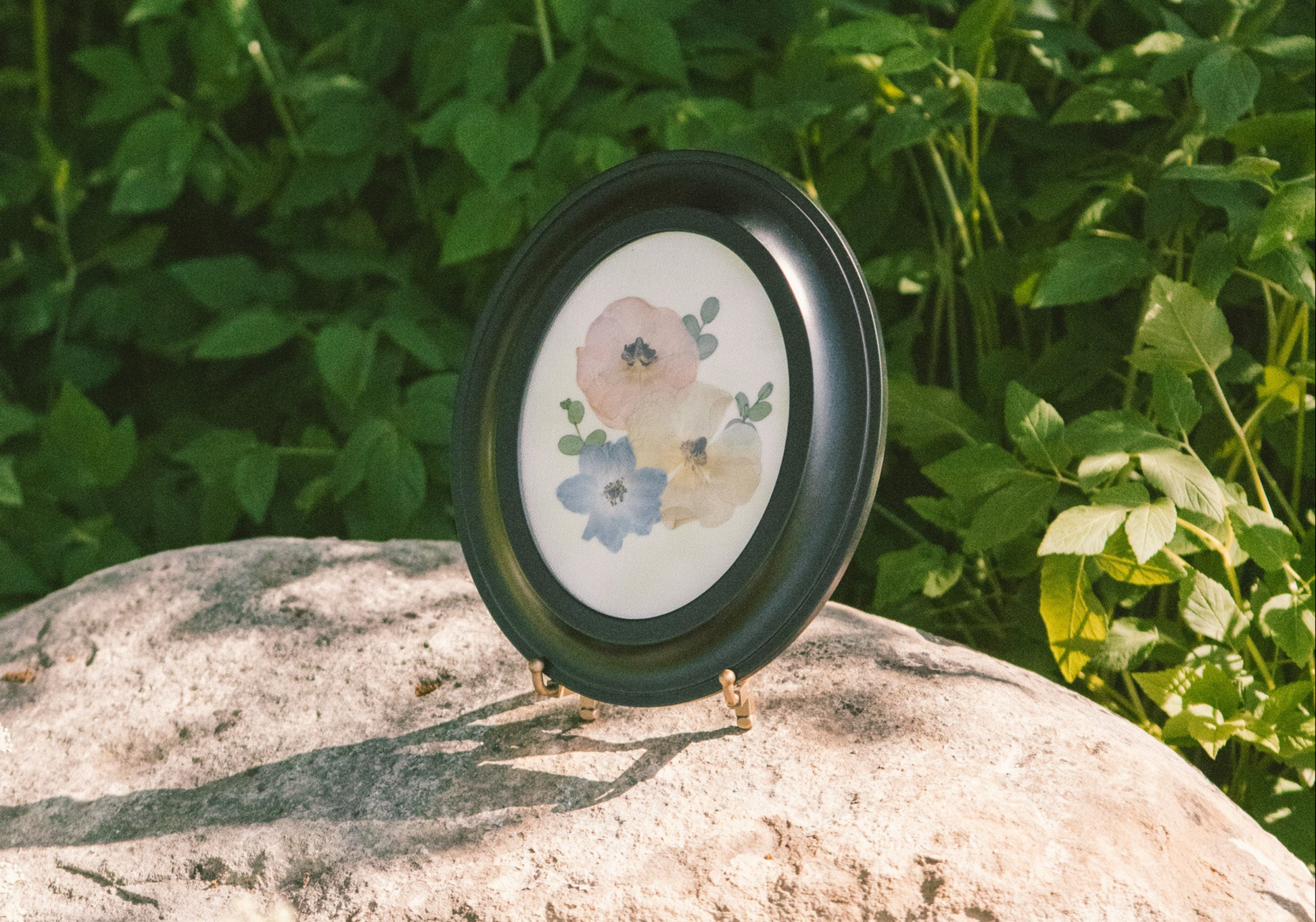 Pressed Floral boutonniere frame with preserved flowers, ideal for displaying wedding or special occasion floral arrangements.