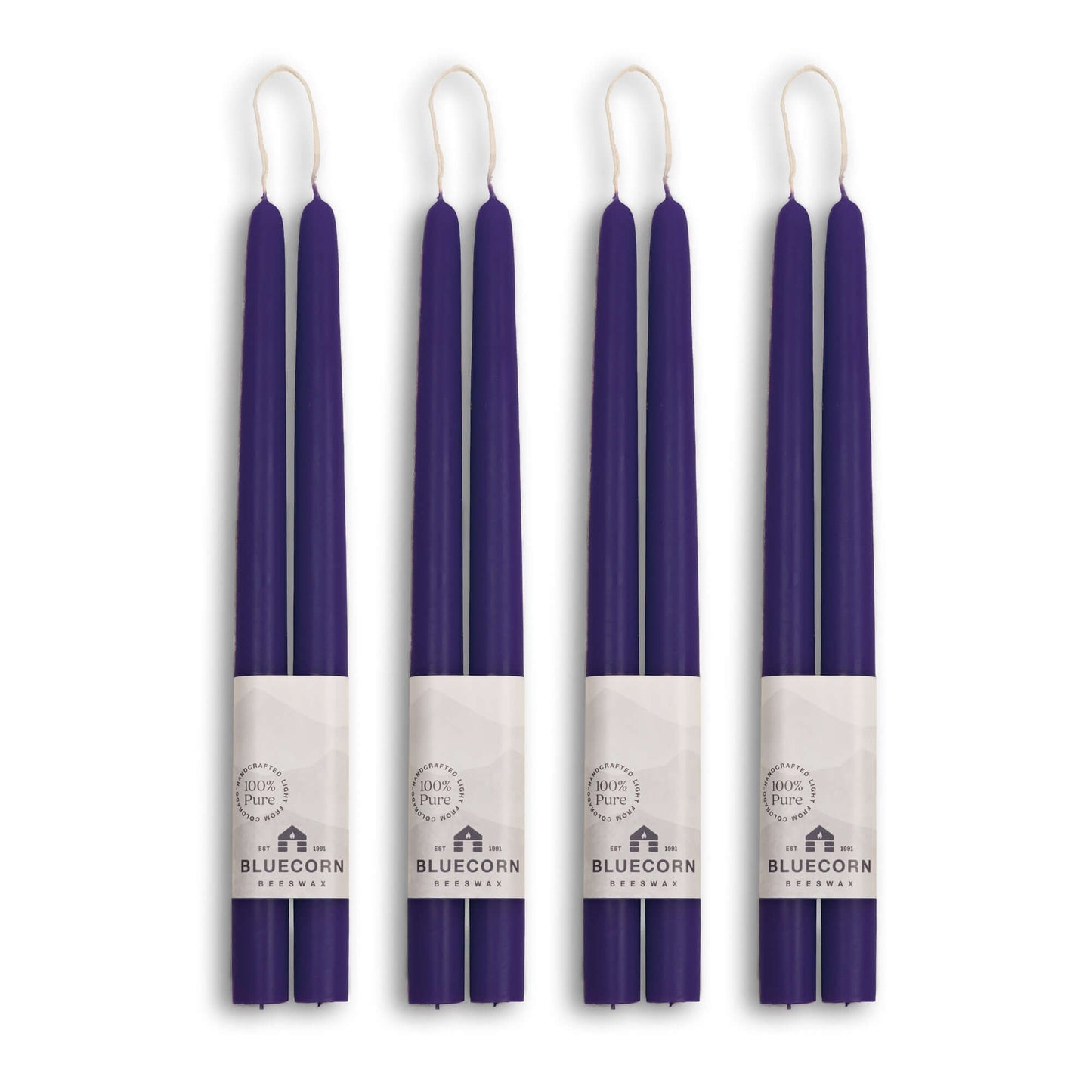 Pair of 12-inch eggplant purple beeswax taper candles from Bluecorn Candles in a bulk bundle, perfect for elegant candle displays.