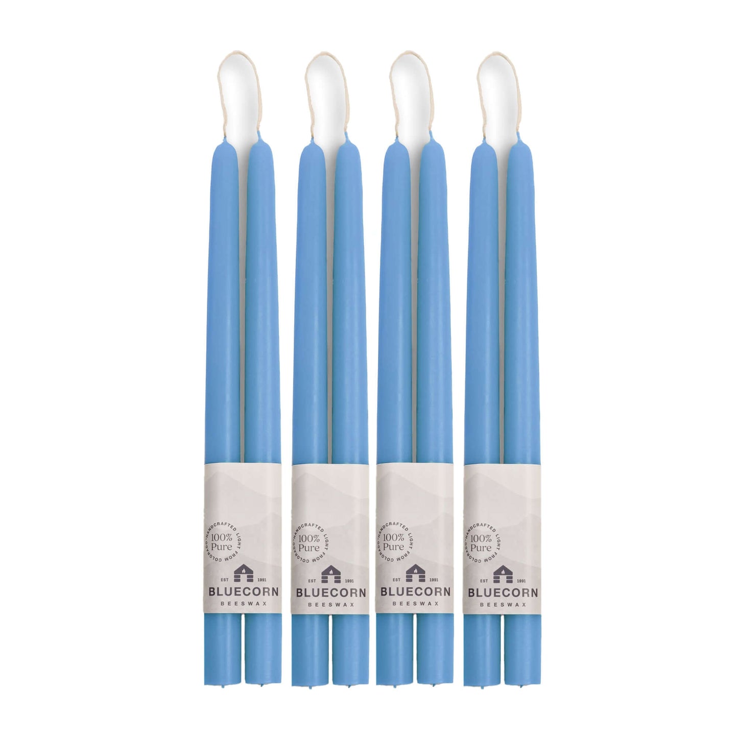 Bluecorn Candles sky-blue beeswax taper candles, 12-inch long, shown in bulk bundle with four pairs, natural and hand-dipped.