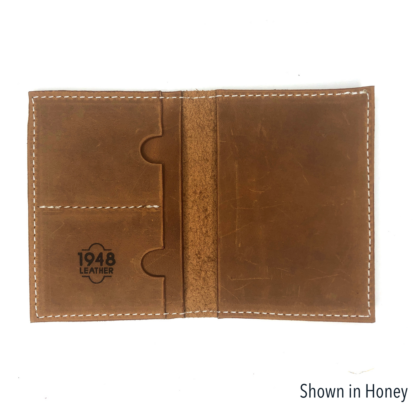 Rebekah Scott Designs Pine passport wallet with multiple card slots and a secure zipper closure, made of stylish durable material.