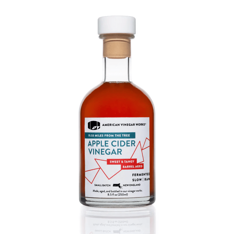 Bottle of 19.53 Miles From The Tree Apple Cider Vinegar by American Vinegar Works, showing the label and clear glass container.
