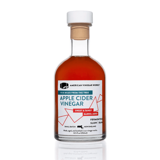 Bottle of 19.53 Miles From The Tree Apple Cider Vinegar by American Vinegar Works, showing the label and clear glass container.
