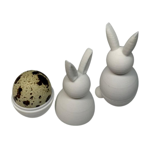 White DIY paintable quail egg cup bunny holder set for Easter and spring home decor, featuring two ceramic bunny egg holders.