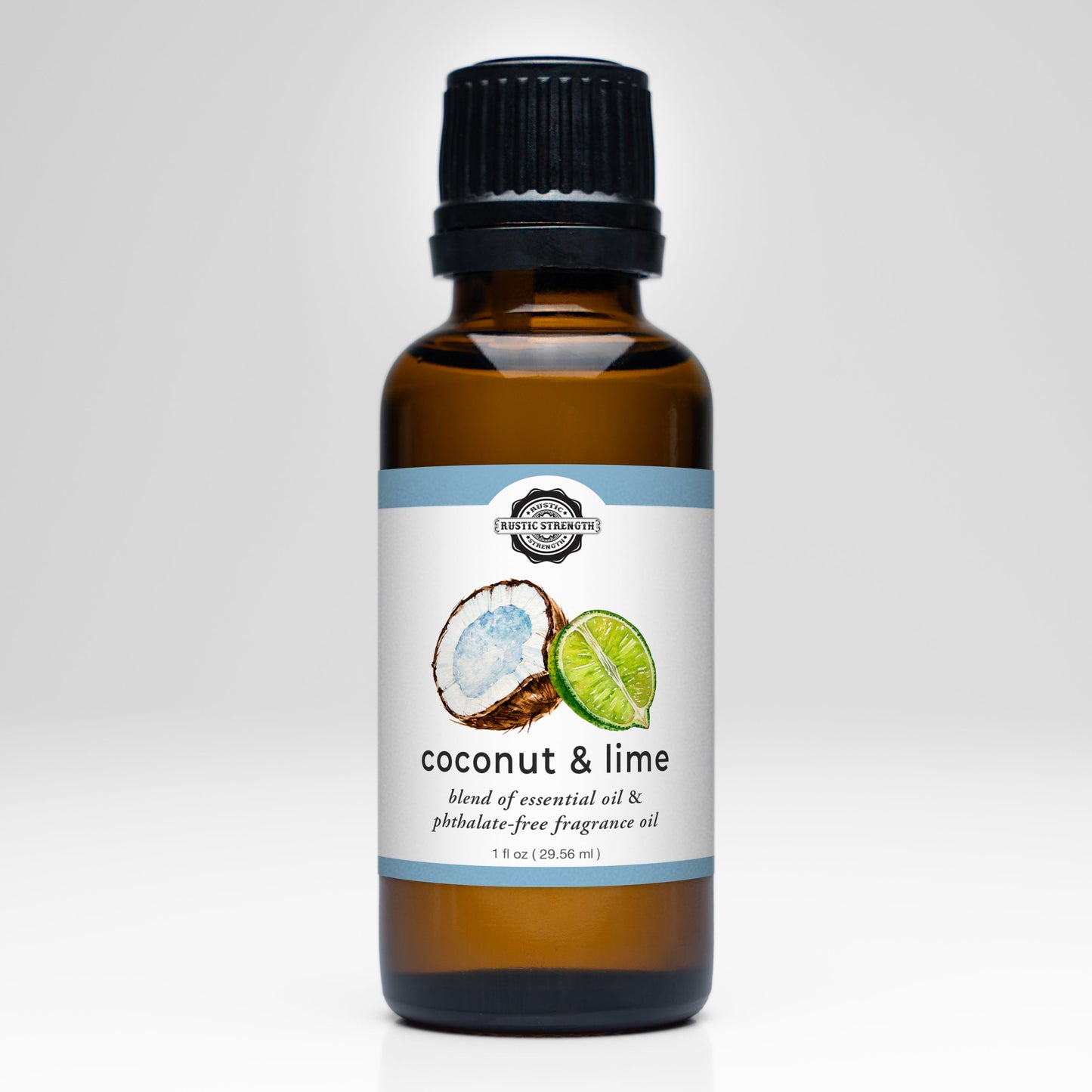 A brown glass bottle with a black cap labeled Coconut & Lime EO / FO Blend by Rustic Strength shows a coconut half and lime slice, featuring lime essential oil and phthalate-free oils—ideal for aromatherapy use, 1 fl oz.