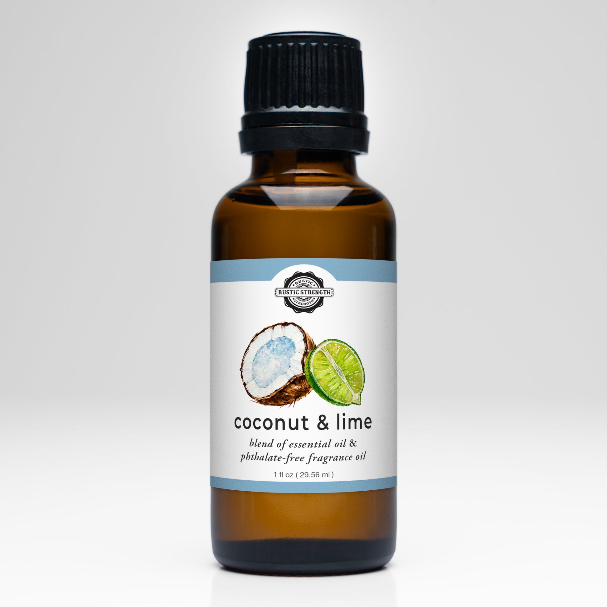 A brown glass bottle with a black cap labeled Coconut & Lime EO / FO Blend by Rustic Strength shows a coconut half and lime slice, featuring lime essential oil and phthalate-free oils—ideal for aromatherapy use, 1 fl oz.