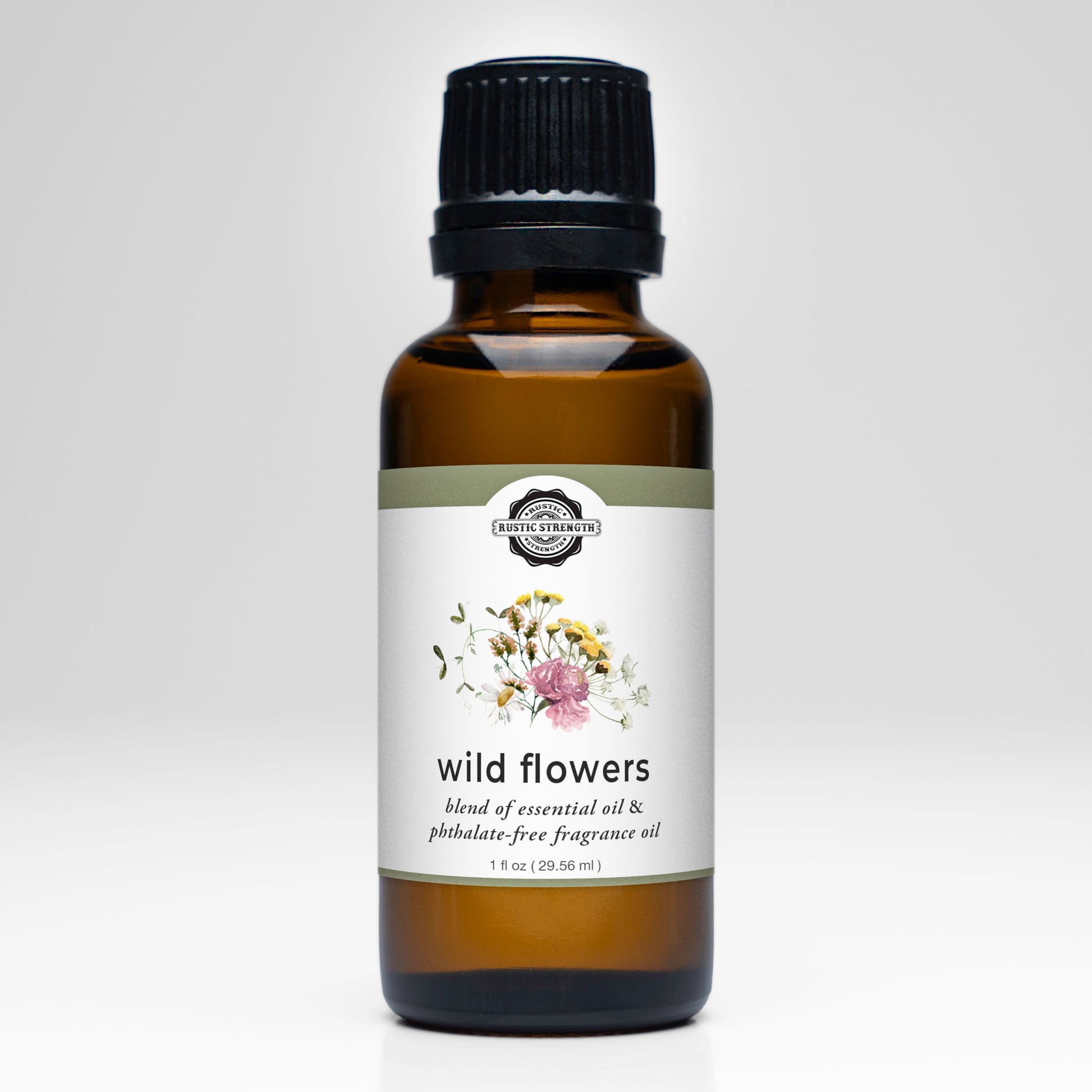 Rustic Strength Wild Flowers essential oil and fragrance oil blend in a 1 oz bottle, featuring a vibrant floral scent.