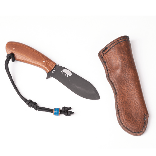 Dakota Adventure Supply DAS Mk 1 Camper Knife with wooden handle and stainless steel blade, outdoor camping tool on white background.
