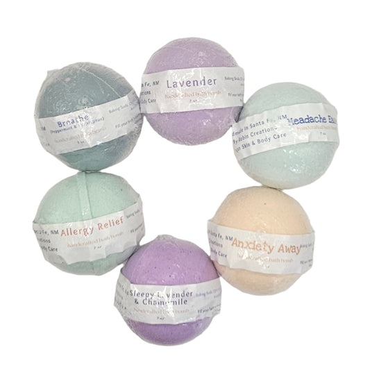 By Robin Creations aromatherapy bath fizzies in a bowl, colorful spherical bath additives for relaxing self-care.