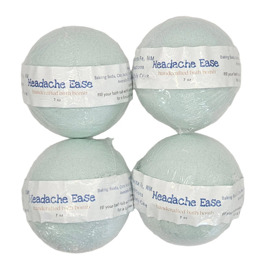 By Robin Creations headache and migraine relief bath fizzies, colorful bath additive with soothing ingredients in a clear jar.