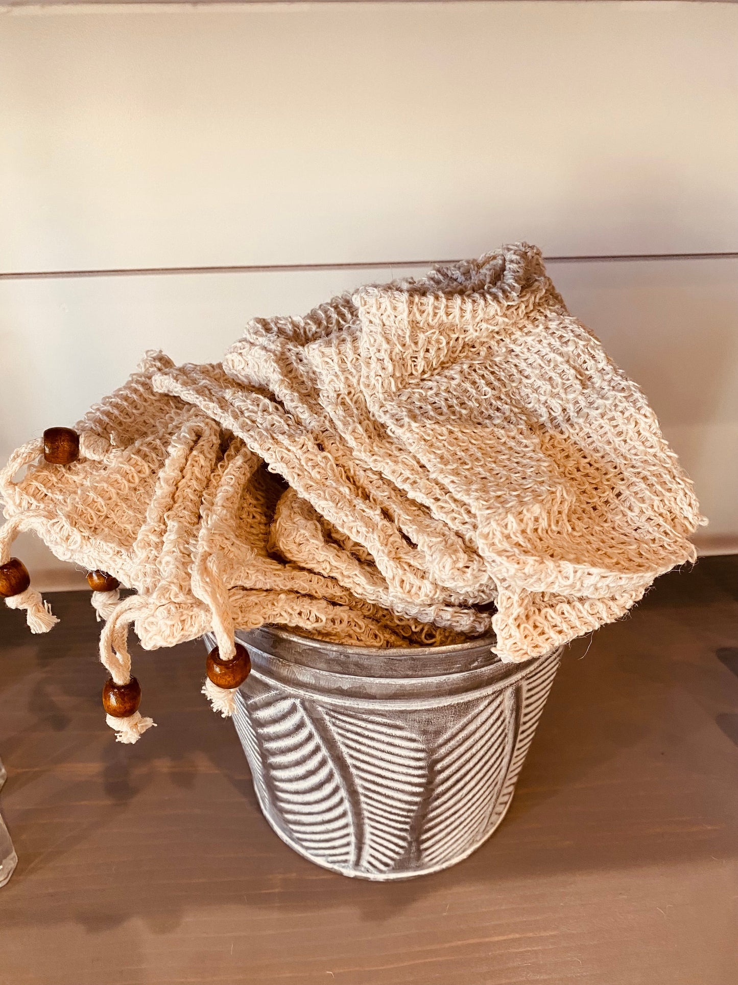 Sisal soap pouch by Onic Brands LLC showing a natural fiber pouch for holding soap, ideal for exfoliating and shower use.